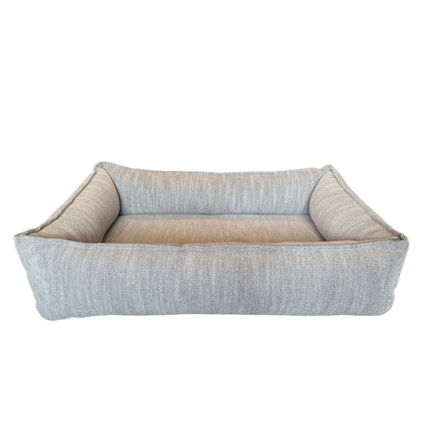 Dog bed with a textured fabric surface on a white background